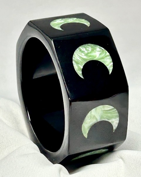 WT6 black octagon resin bangle with aqua crescent inlays